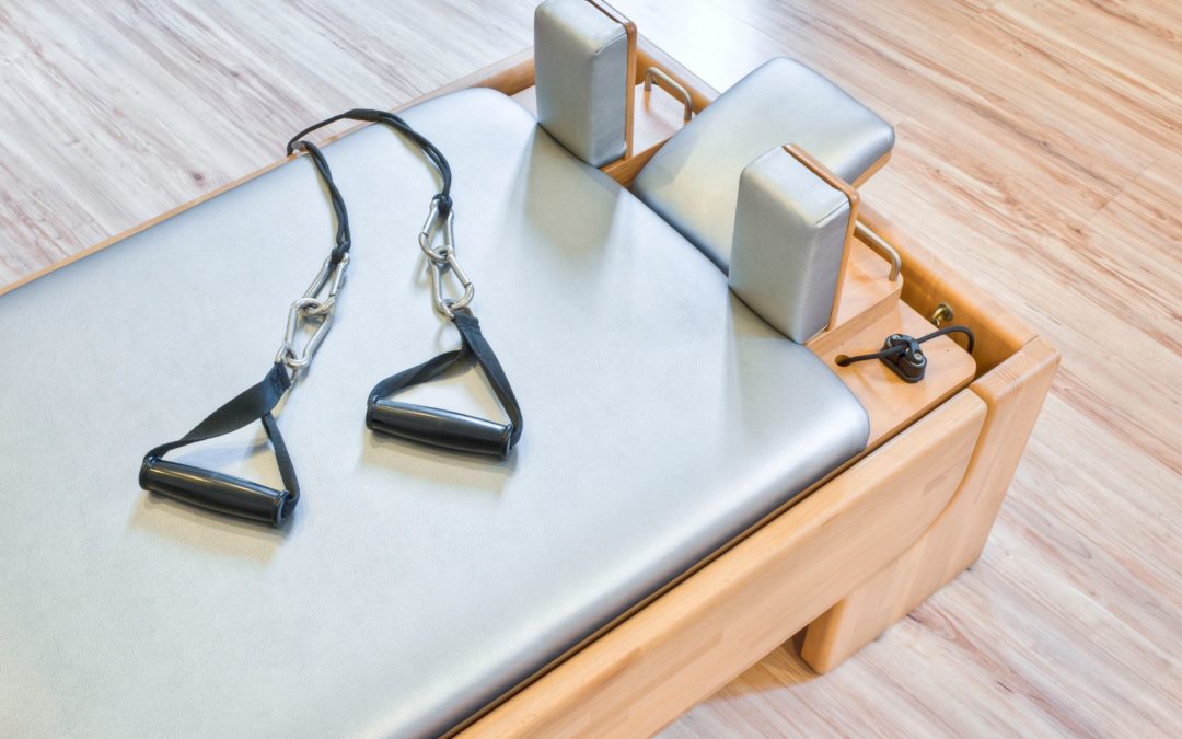 Mat, Reformer, Trapeze: What’s the Difference Between Pilates Class Options?